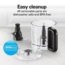 Cordless food chopper with clear bowl and black base, lid and blade assembly