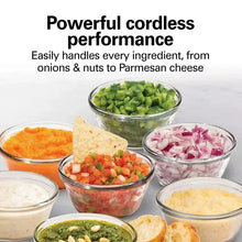 Cordless food chopper with chopped ingredients in glass bowls