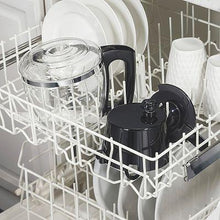Black coffee maker base in dishwasher rack with accessory carafe