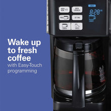 Black coffee maker front panel with Easy-Touch buttons and carafe area