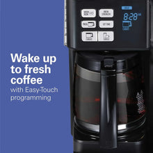 Black coffee maker with digital display and programmable brew buttons