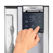 Hamilton Beach FlexBrew 6-in-1 coffee maker control panel with finger pressing buttons