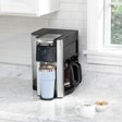 Hamilton Beach FlexBrew 6-in-1 coffee maker on countertop with black base