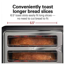 Toaster with long bread slices in extra-long slots and internal heating racks