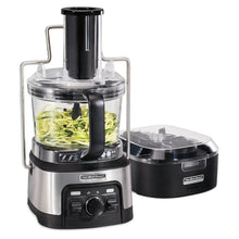 Stainless steel food processor with clear bowl, black motor base, and blade assembly