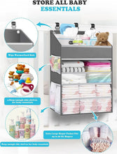 Grey hanging diaper organizer with deep side shelves and extra-large paper pocket