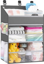 Grey hanging baby diaper caddy organizer with paper pocket and open shelves