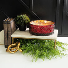 Hanna’s 5-wick luxury candle in red patterned glass jar with wicks lit