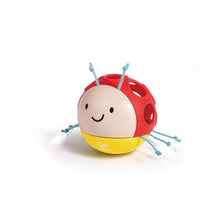 Ladybug baby rattle with red shell, yellow base, and blue dangling arms
