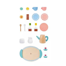 Toy tea set pieces: teapot, cups, plates, tea cards and pretend food