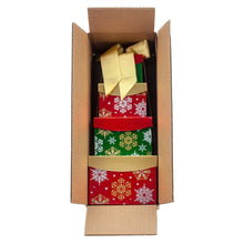 4-tier holiday sweet tower in an open carton with gold ribbon and red/green patterned tiers