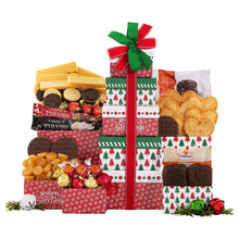 Stacked holiday gift boxes tower with red ribbon and green bow, red and green tree print