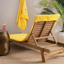 Harbor Bay cotton beach towel, 2-pack, yellow trellis pattern, folded on chaise lounge
