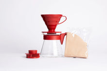 Hario V60 pour over coffee starter set with red V60 dripper, glass carafe, filter