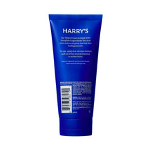 Harry's shave cream tube back view, blue squeeze container with barcode panel