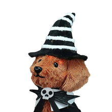 Witch dog decoration: tan plush dog with striped black hat, skull bow tie, black cape