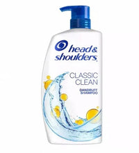 White shampoo bottle with blue pump; Classic Clean dandruff shampoo label on front