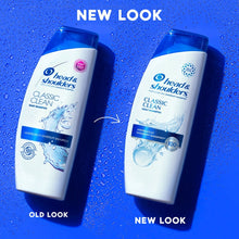Two Classic Clean dandruff shampoo bottles with blue cap and white label