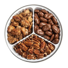Round pecan tin with three sections: roasted, chocolate-coated, and praline pecans