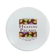 Round pecan tin lid with Heaton Pecans label
