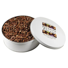 Roasted salted pecans in a round open metal tin