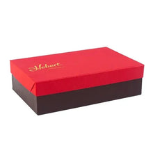 Red-and-brown gift box for milk chocolate cranberry cashew caramels