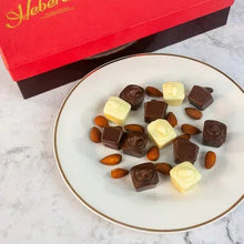 Plate of Hebert chocolate assortment with dark and white chocolates