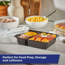 Two-compartment food storage containers with lids, black, filled with prepared meals