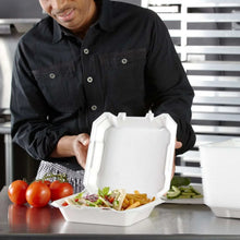 Open white foam hinged lid container, 1 compartment, held for serving food
