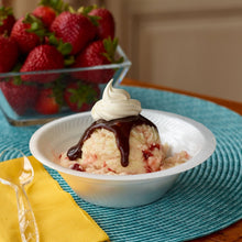 White foam dessert bowl with ice cream and chocolate topping