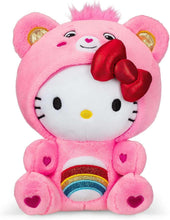 Pink cheer bear plush with Hello Kitty face, red bow and rainbow belly outfit