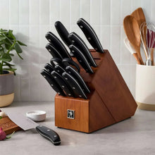 Henckels knife block set on countertop with black knives in wooden holder