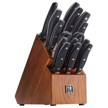 Henckels knife block set with black knives arranged in a wooden block
