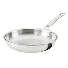Stainless steel skillet with polished interior and loop handle