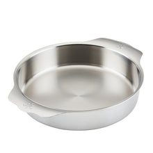 Stainless steel round cake pan with flared rim and shallow sides