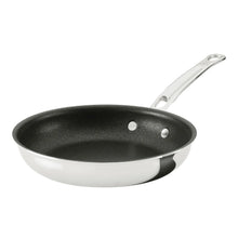 Nonstick skillet with black interior, stainless exterior, and riveted handle with hanging holes.