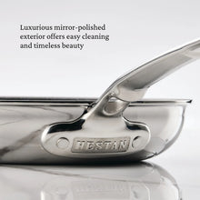 Polished stainless steel skillet handle with Hestan logo plate