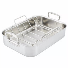 Stainless steel roasting pan with wire rack and two side handles, top view angle