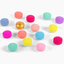 Set of assorted mini bath bombs in pastel and bright colors, round tablets