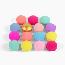 Assorted mini bath bombs in pink, blue, purple, yellow, and green round tablets
