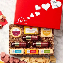 Open Valentine savory snacks gift box with crackers, cheese rounds, and beef sausages