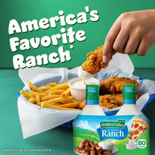 Ranch dressing promo with two bottles and a hand dipping a crunchy snack into sauce