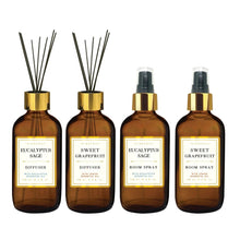 Set of 4 amber glass diffuser and room spray bottles with gold caps and labels