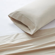 Cream sheet corner with flat fold and stitched edge