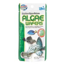 Hikari algae wafer fish food bag with green-and-white label and tropical fish icons