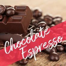 Chocolate blocks and cocoa-coated beans with dark chocolate drizzle.