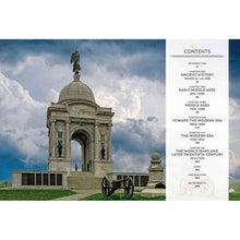 Hardcover history book showing contents and photo of stone arch monument