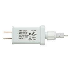 LED light module with plug and connector, showing an electrical information label