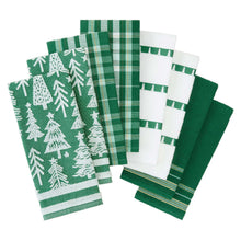 Pack of green holiday kitchen towels with tree print, plaid, and striped patterns.