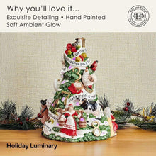 Christmas tree LED figurine with green-and-white trunk, red-clad people, and bird accents